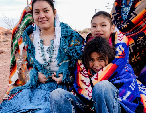 Native American woman with children