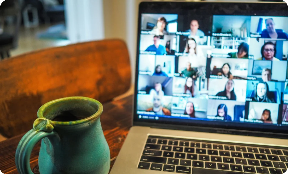 Laptop showing webinar