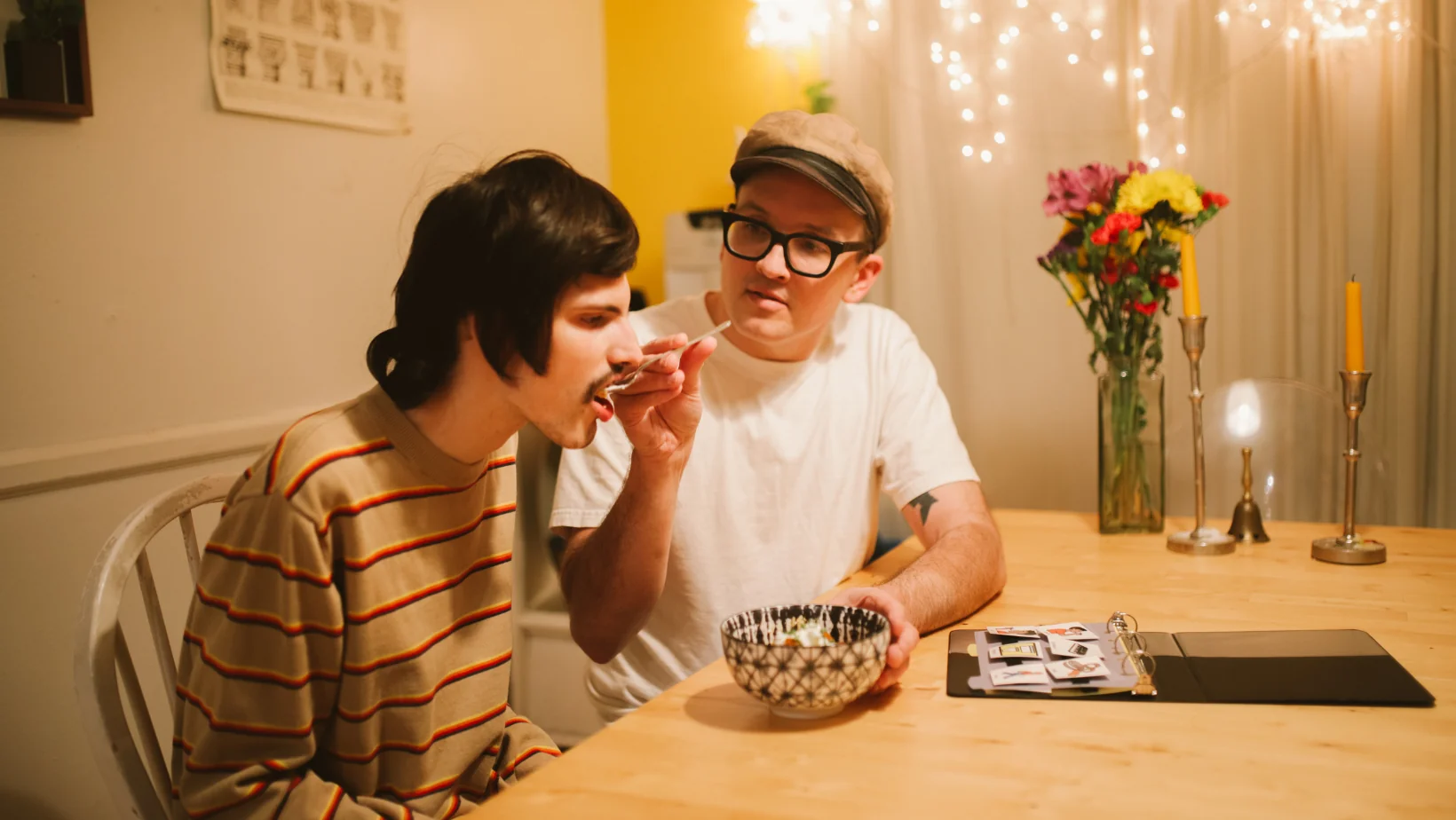 Person helping another with meal